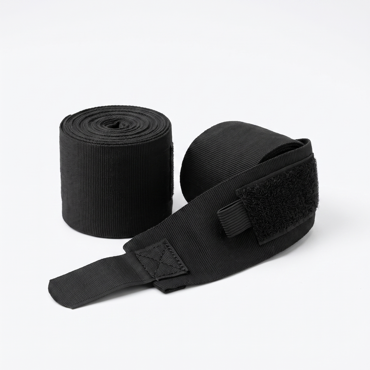 Matte black 180-inch boxing hand wraps, rolled pair